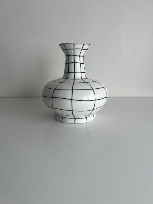 Black and white checkered vase